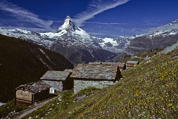 The Matterhorn and Findeln Village The Matterhorn (14,692') in the Pennine Alps on the border between Switzerland and Italy is probably one of the most recognizable mountains in the world. This picture was taken from Findeln Village in the beautiful meadows above the town of Zermatt in Valais Canton in Switzerland. jeff goulden switzerland stock pictures, royalty-free photos & images