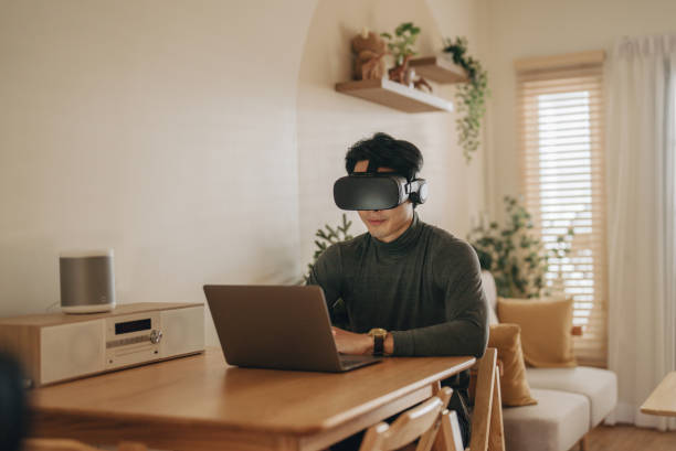 the metaverse : young man meeting with virtual reality at home. - vr meeting stockfoto's en -beelden