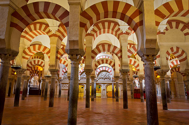 The Mezquita From Cordoba, Spain Once A Mosque But Now A Catholic Cathedral, The Mezquita Is Famous For Its Arches. cordoba spain stock pictures, royalty-free photos & images