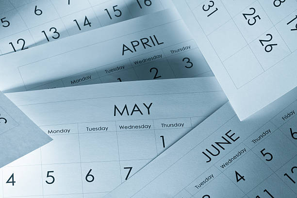 The months and days of the year on calendar paper stock photo