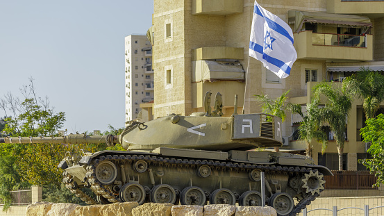 The monument tank M60 on a pedestal in the center of the crossroad in Beer Sheba