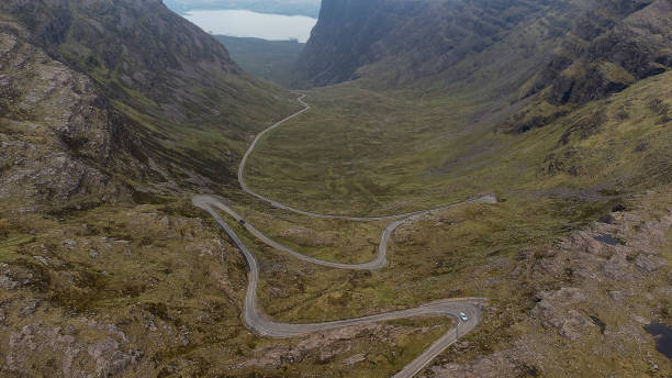 The narrow winding mountain road at Bealach na Ba near Applecross in the Scottish Highlands, UK stock photo