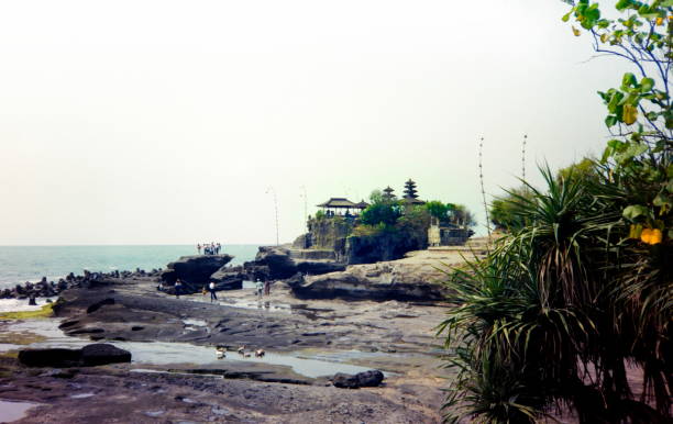 The nineties. Pura Tanah Lot, Sea Water Temple. Bali - Java,Indonesia. stock photo