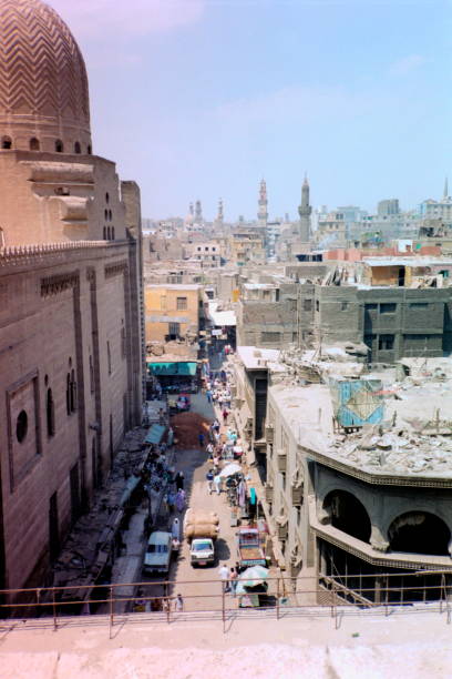 The nineties. The alley between "Bab Zuweila" and the famous area of Khan el Khalili bazaar. Old Cairo, Egypt 1991. stock photo