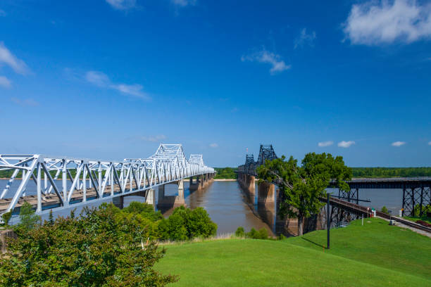 The Old Vicksburg  one rail line; and the new Vicksburg Bridge cantilever bridges cross the Mississippi River between Delta, Louisiana and Vicksburg stock photo