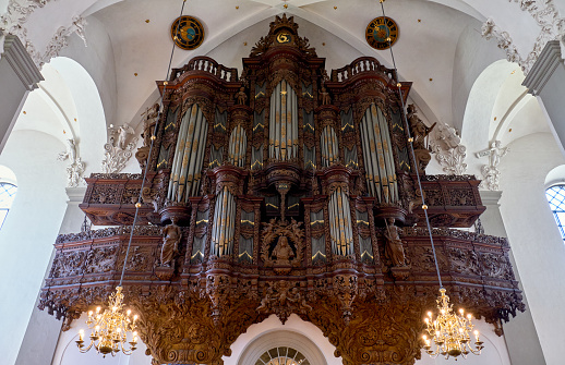 Denmark, Copenhagen - Jule 1, 2018: The organ is decorated with wood carvings in the Church of Our Saviour.