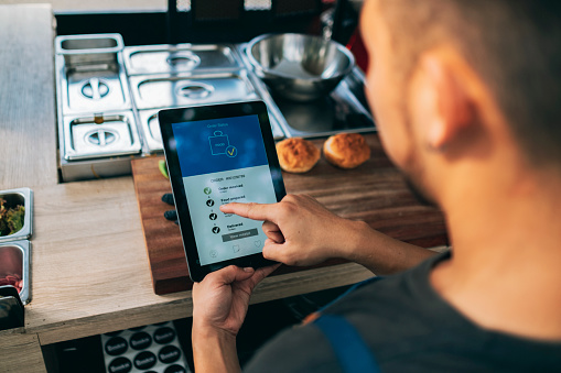 The owners of the food cart uses the food delivery platform to view the order