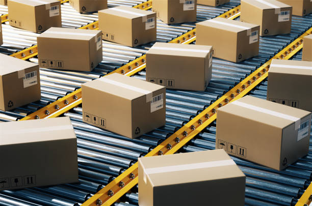 The parcel is on the conveyor belt,Concept of automatic logistics management.3d rendering. The parcel is on the conveyor belt,Concept of automatic logistics management.3d rendering. conveyor belt stock pictures, royalty-free photos & images