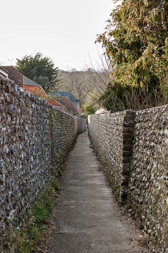 The path between traditional English houses outside the town.