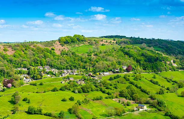 The Peak District A small village (many multiple dwellings and farm buildings) in the Peak District area of the UK. peak district national park stock pictures, royalty-free photos & images
