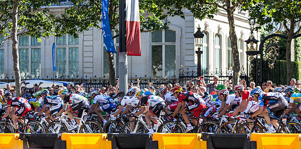 the peloton in paris - tour de france cycling bildbanksfoton och bilder