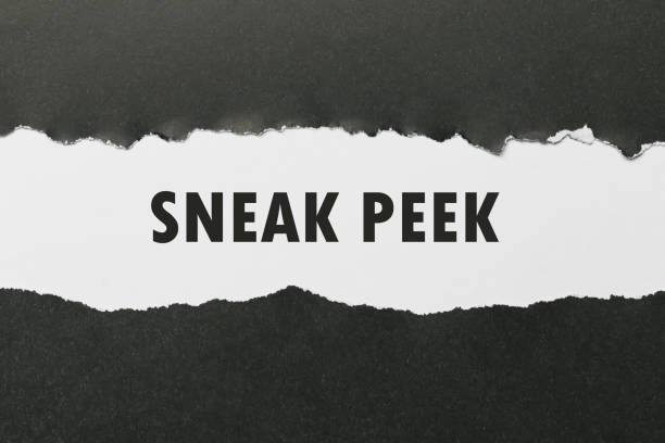 The phrase Sneak Peek appearing behind torn paper. stock photo