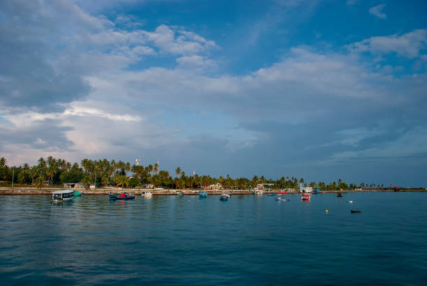 The port at Maamigili in the Alif Dhaal Atoll of the Maldives The port at Maamigili in the Alif Dhaal Atoll of the Maldives atoll stock pictures, royalty-free photos & images