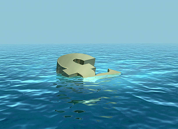 The pound sinking or struggling stock photo