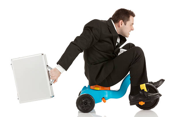 The rat race The rat racehttp://www.twodozendesign.info/i/1.png adult tricycle stock pictures, royalty-free photos & images