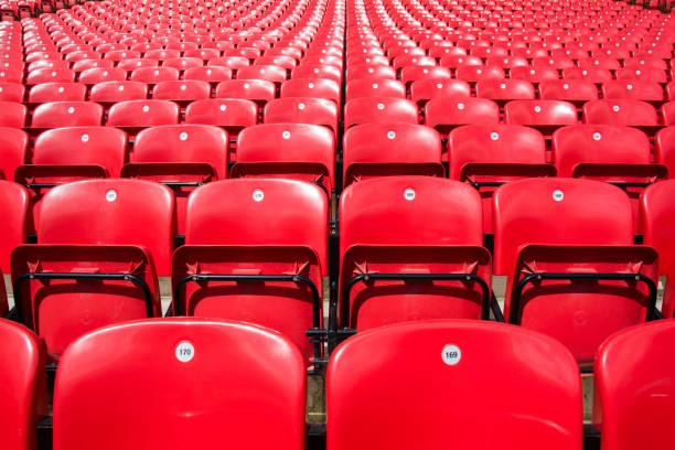 The red chairs. Red chairs in rows in football stadium. liverpool england photos stock pictures, royalty-free photos & images