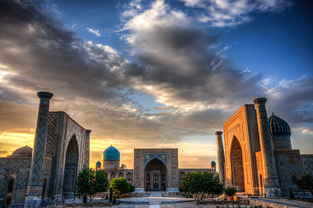 The Registran at sunset in Samarkand, Uzbekistan The Registan was the heart of the ancient city of Samarkand in Uzbekistan and one of the main stop on the silk road from China to Europe samarkand stock pictures, royalty-free photos & images