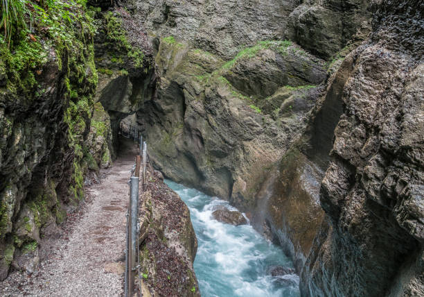 The river in Partnach Gorge of mountains in Bavaria, Germany The river in Partnach Gorge of mountains in Bavaria, Germany . partnach gorge stock pictures, royalty-free photos & images