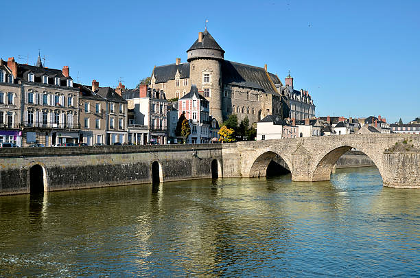 The river Mayenne at Laval in France The river Mayenne with the castle and the old bridge (Pont-Vieux in french), at Laval, commune in the Mayenne department in north-western France arch architectural feature photos stock pictures, royalty-free photos & images