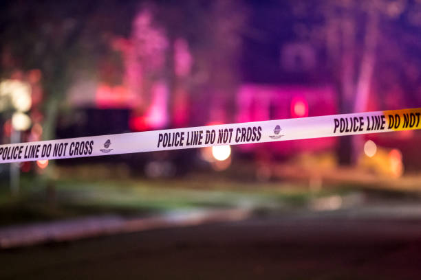 The scene of a Police shooting in Royal Oak, MI May 14th 2018 (2018-05-14 Royal Oak, MI) Police barrier on the scene of a shooting near the intersection of Hudson Ave and McLean Ave in Royal Oak just after 3:13am Monday May 14th 2018. michigan shooting stock pictures, royalty-free photos & images
