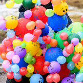istock The seller of balloons. Beautiful balloons for sale. 1254739039