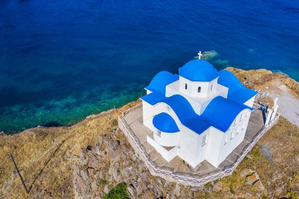 The small church of Agios Nikolaos at the entrance of the port of Myrina on the island of Lemnos in Greece stock photo