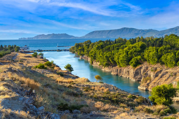 The stunning Corinth Canal connecting the Gulf of Corinth in the Ionian Sea with the Saronic Gulf in the Aegean Sea. stock photo