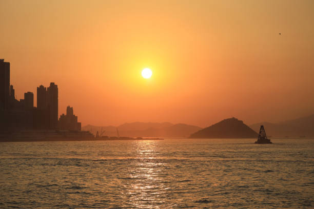 the sunset at Belcher Bay,  Kennedy Town , Hong Kong 15 jan 2021 stock photo