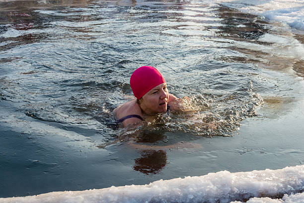 the swim in the icy water, 24 january 2016. - ice swimming stockfoto's en -beelden