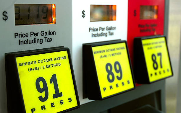 The three different gas prices at the gas station Gas prices at the pump high up stock pictures, royalty-free photos & images