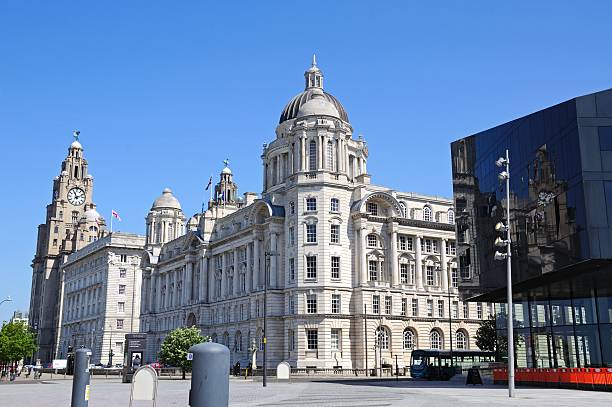 The Three Graces, Liverpool. Liverpool, United Kingdom - June 11, 2015: The Three Graces consisting of the Liver Building, Port of Liverpool Building and the Cunard Building with tourists enjoying the sights, Liverpool, Merseyside, England, UK, Western Europe. liverpool docks and harbour building stock pictures, royalty-free photos & images