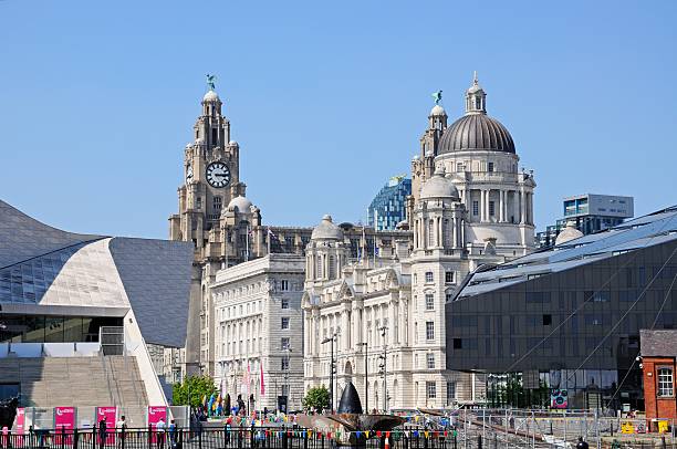 The Three Graces, Liverpool. Liverpool, United Kingdom - June 11, 2015: The Three Graces consisting of the Liver Building, Port of Liverpool Building and the Cunard Building with tourists enjoying the sights, Liverpool, Merseyside, England, UK, Western Europe. liverpool docks and harbour building stock pictures, royalty-free photos & images
