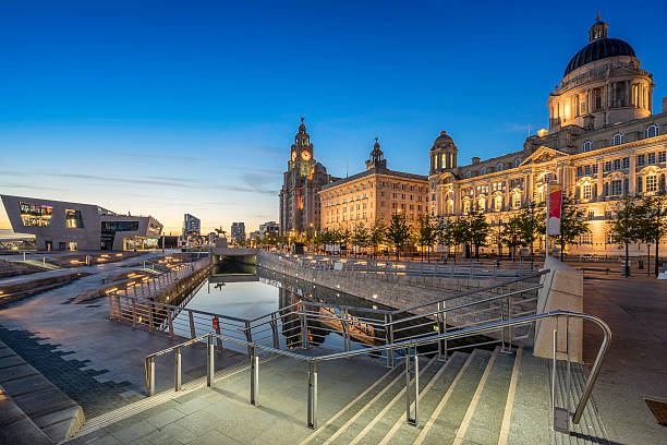 The Three Graces on Liverpools waterfront The Liver building next to the Port Authority and the Cunard Building on Pier Head river mersey liverpool stock pictures, royalty-free photos & images