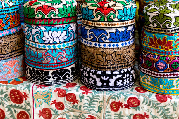 The traditional Uzbek cap named tubeteika, decorated with multi colored embroidery. Bukhara, Uzbekistan, Central Asia The traditional Uzbek cap named tubeteika, decorated with multi colored embroidery. Bukhara, Uzbekistan, Central Asia bukhara stock pictures, royalty-free photos & images