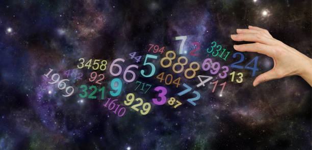 The Universal Significance of Numbers Female hand about to take number 24 among a group of scattered multicolored transparent numbers on a wide deep space background with copy space numerology stock pictures, royalty-free photos & images