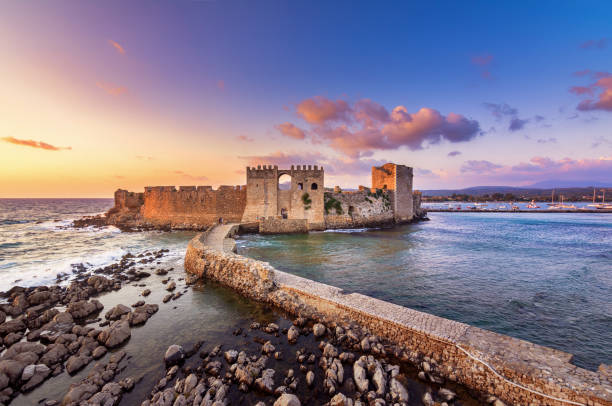The Venetian Fortress of Methoni at sunset in Peloponnese, Messenia, Greece The Venetian Fortress of Methoni at sunset in Peloponnese, Messenia, Greece peloponnese stock pictures, royalty-free photos & images