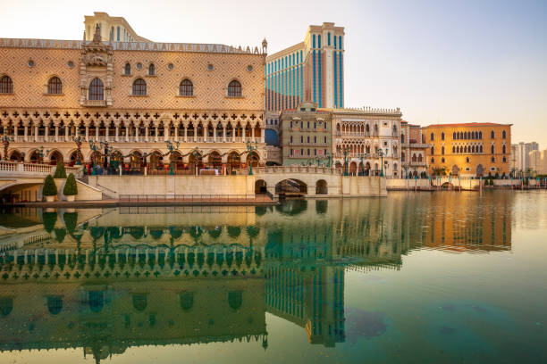 The Venetian Macao Macau, China - December 9, 2016: The Venetian Resort with luxury shopping centre, mirrored on lake at twilight, the largest casino in the world and the largest single structure hotel building in Asia. the venetian macao stock pictures, royalty-free photos & images