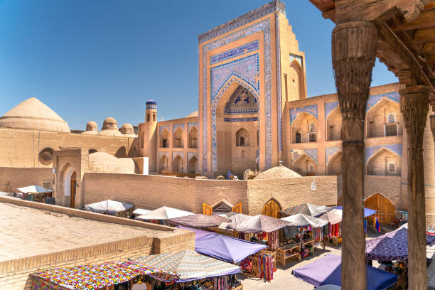 The view o famous bazaar street in Khiva The view o famous bazaar street in Khiva bukhara stock pictures, royalty-free photos & images