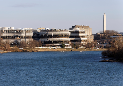 Washington, DC, USA – February 20, 2013: The Watergate Complex as seen from across the Potomac River. The Watergate complex is a group of five buildings in the Foggy Bottom neighborhood of Washington, DC.