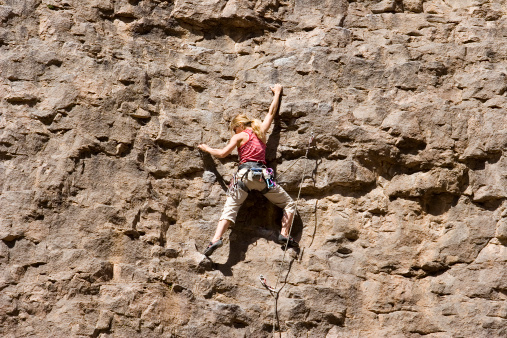 Physically fit blond female rock climber.Click on an image to go to my Rock Climbers Lightbox.