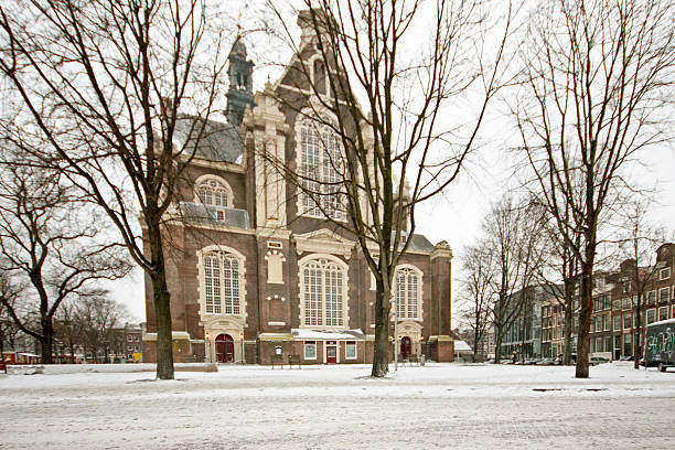 the westerkerk in winter amsterdam netherlands - anne frank stockfoto's en -beelden