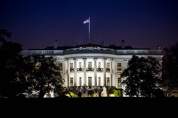 The White House at Night A Night image of The White House white house stock pictures, royalty-free photos & images
