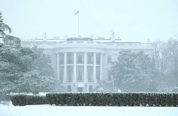 The White House during a snowstorm stock photo