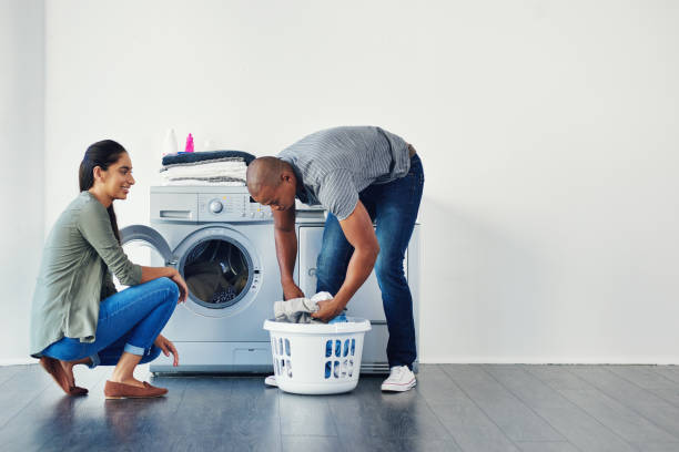 1,257 Couple Doing Laundry Stock Photos, Pictures &amp; Royalty-Free Images -  iStock
