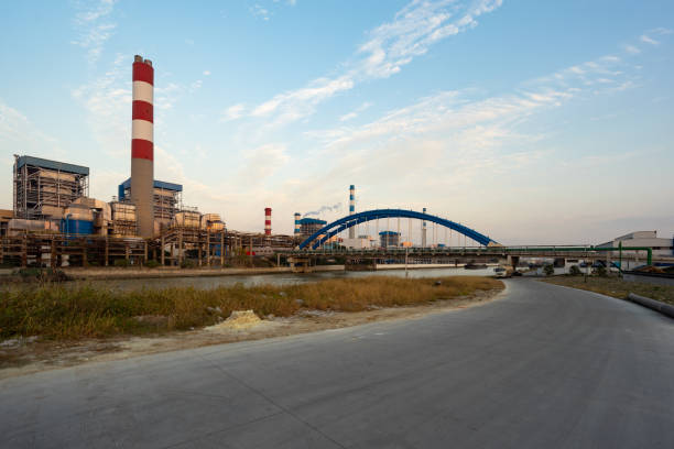 Thermal power plant stack and road stock photo