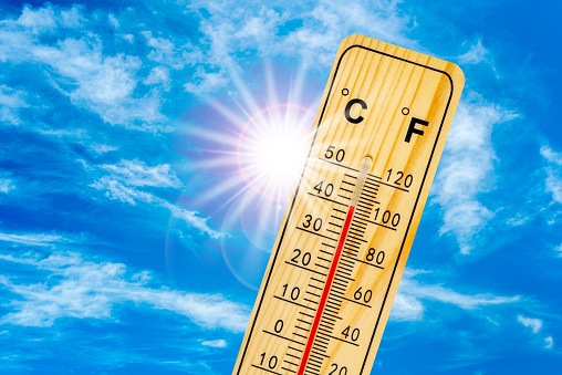 Thermometer With High Temperature Sunbeam And Clear Sky Stock Photo ...