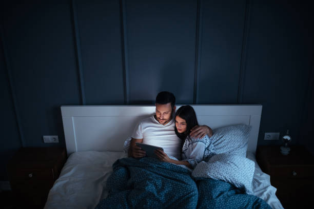 1,340 Couple Watching Movie In Bed Stock Photos, Pictures & Royalty-Free  Images - iStock