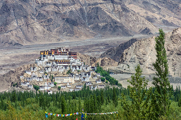 Thikse Monastery near Leh, Ladakh, India Thikse Monastery seen from the opposite side of Indus River. Thikse Monastery (also Thiksay Gompa) is a monastery affiliated with the Gelug sect of Tibetan Buddhism. It is located on top of a hill in Thiksey village, approximately 19 kilometres east of Leh in Ladakh, India. It is located at an altitude of 3,600 metres (11,800 ft) in the Indus Valley.  ladakh region stock pictures, royalty-free photos & images