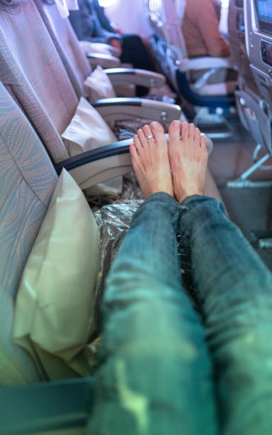 A Thing You Should Never Do on an Airplane - Barefoot stock photo