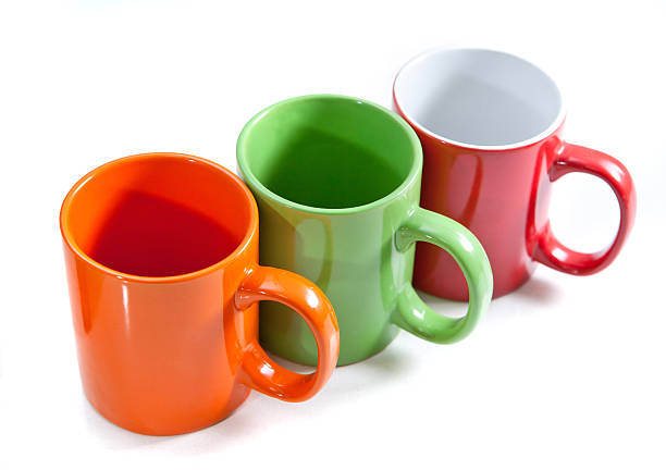 three colorful cups stock photo